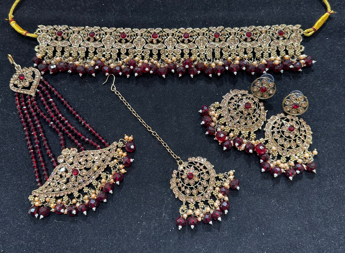 PA7803 Maroon with full gold colour choker comes with earrings tikka and jhumar