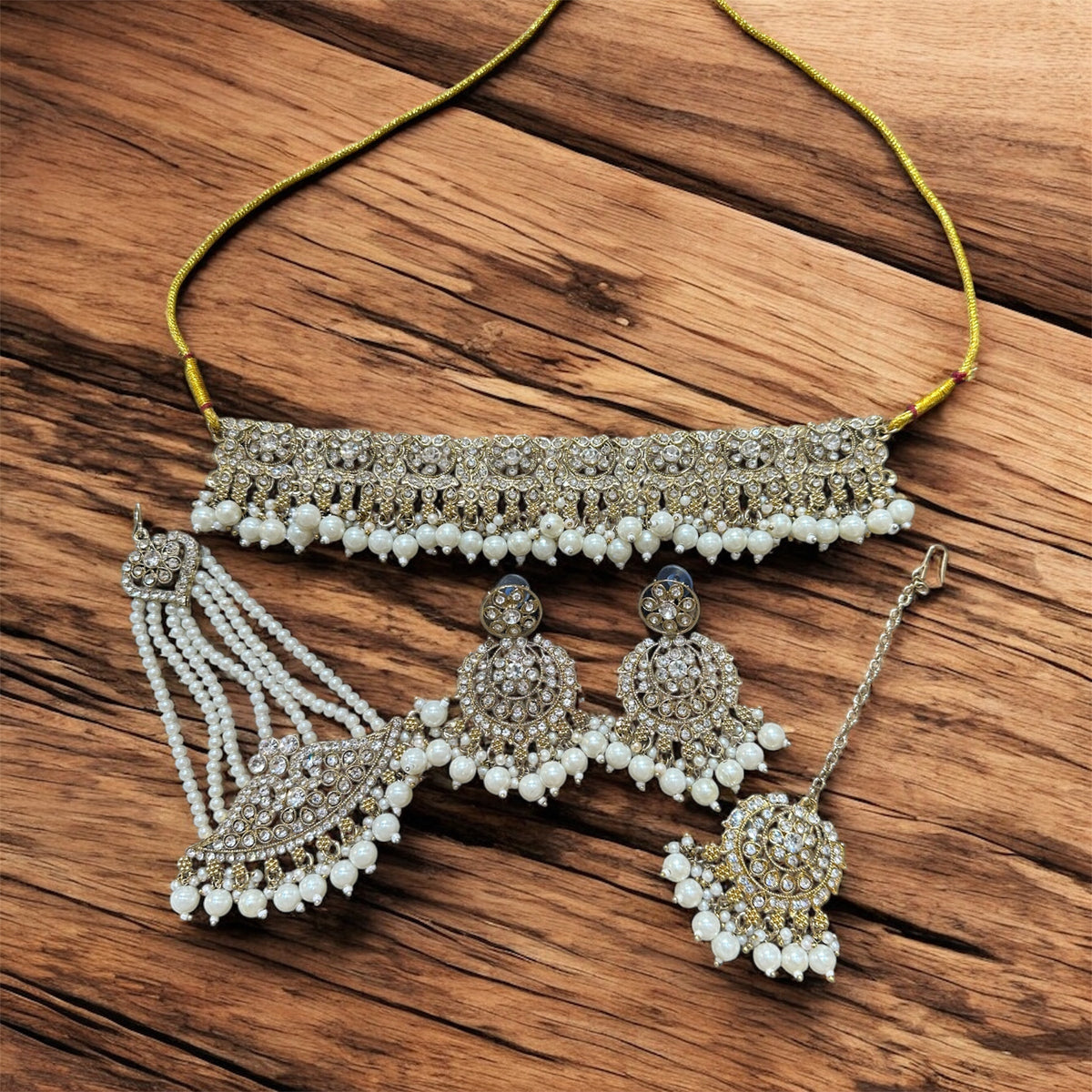 PA7802 Gold with white stones choker set comes with earrings tikka and jhumar