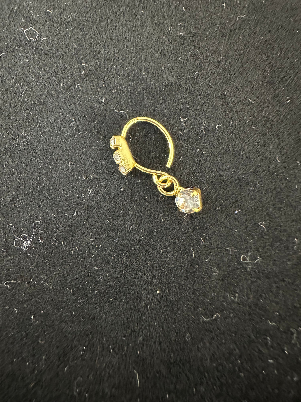 PA16 gold colour nose ring with dangling stones