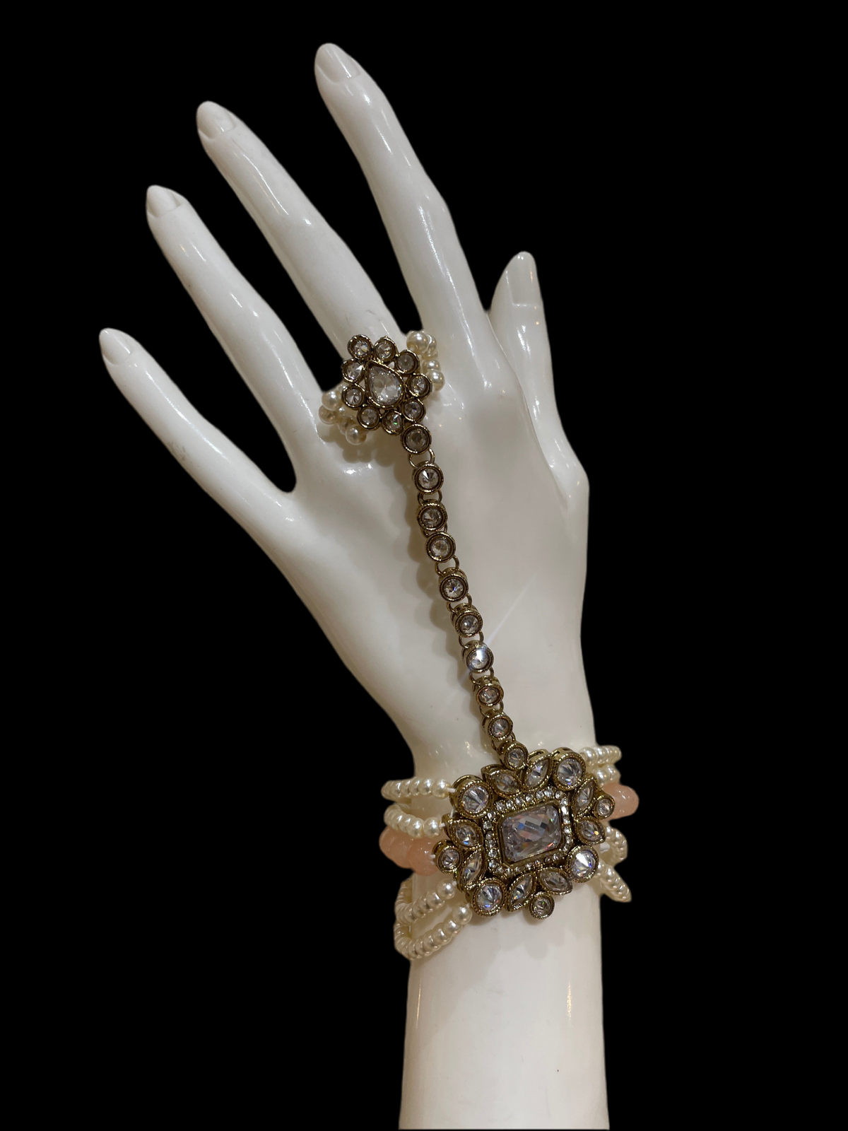 AN07 peach colour polki hand piece