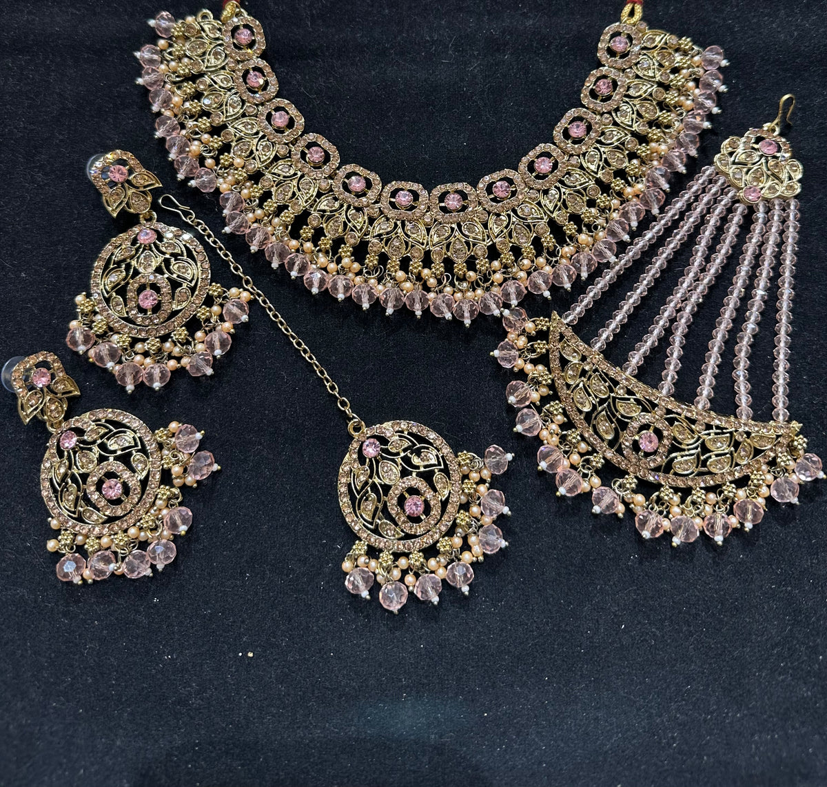 PA7803 Pink with full gold colour necklace set comes with earrings tikka and jhumar