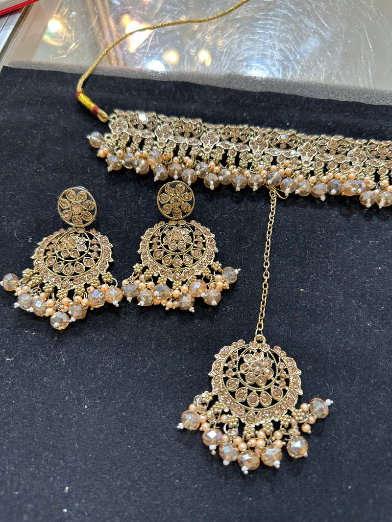 PA7802 Full gold colour choker set with earrings tikka and jhumar