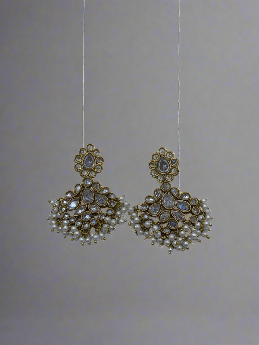 Gold and white earrings