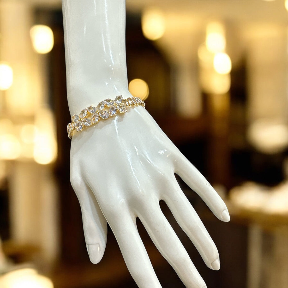 PA116 Gold with white American diamond stones bracelet