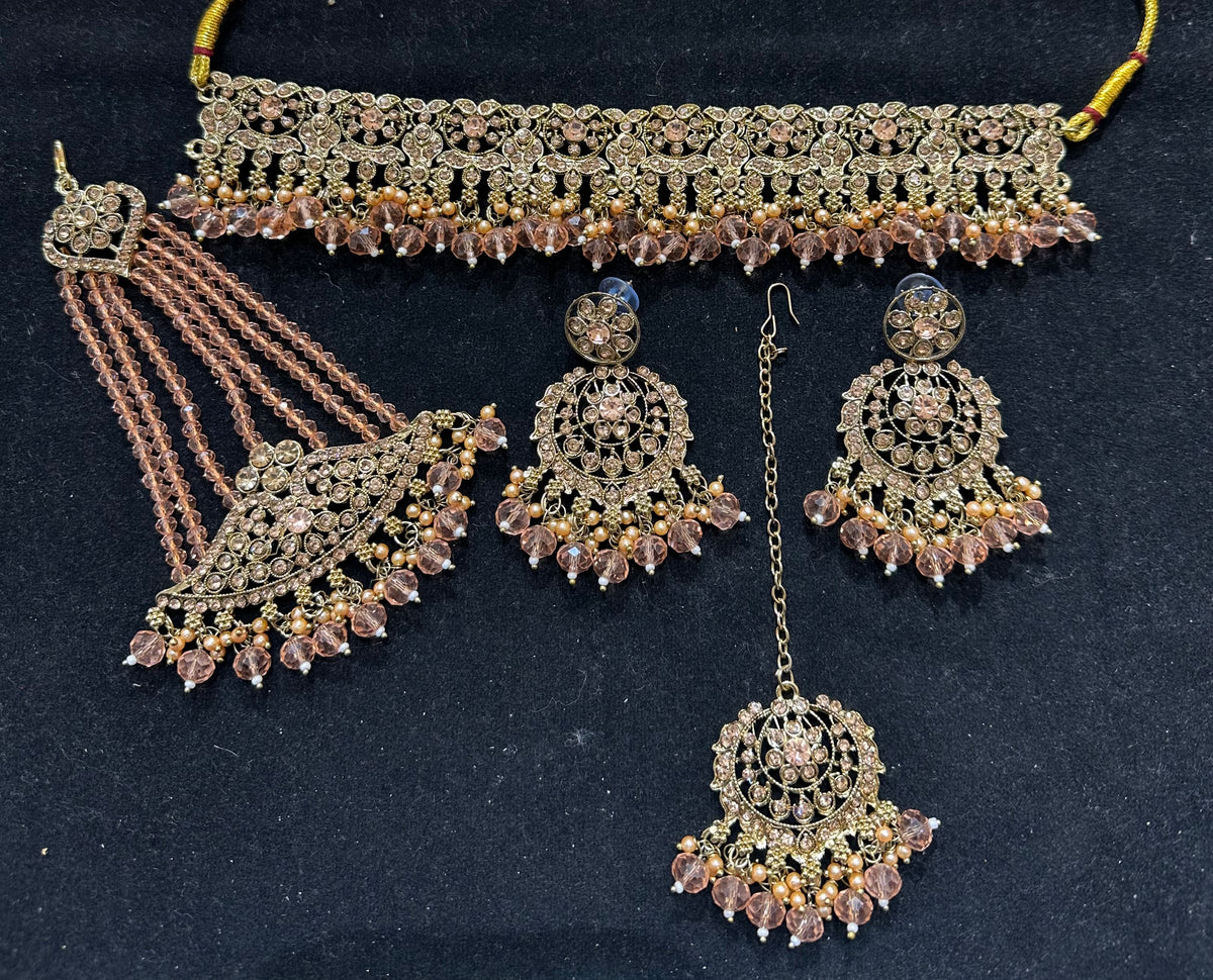 PA7803 peach with full gold choker comes with earrings tikka and jhumar