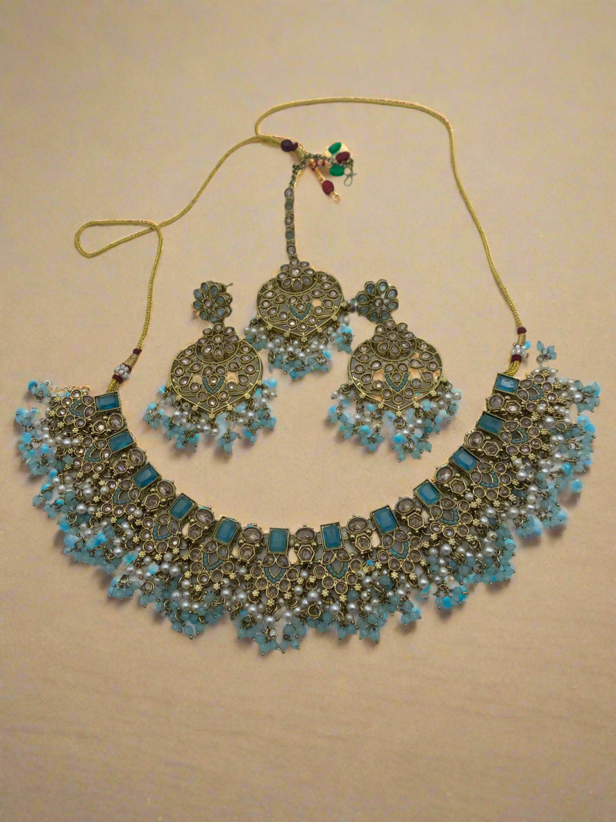 Gold and pastel blue necklace set