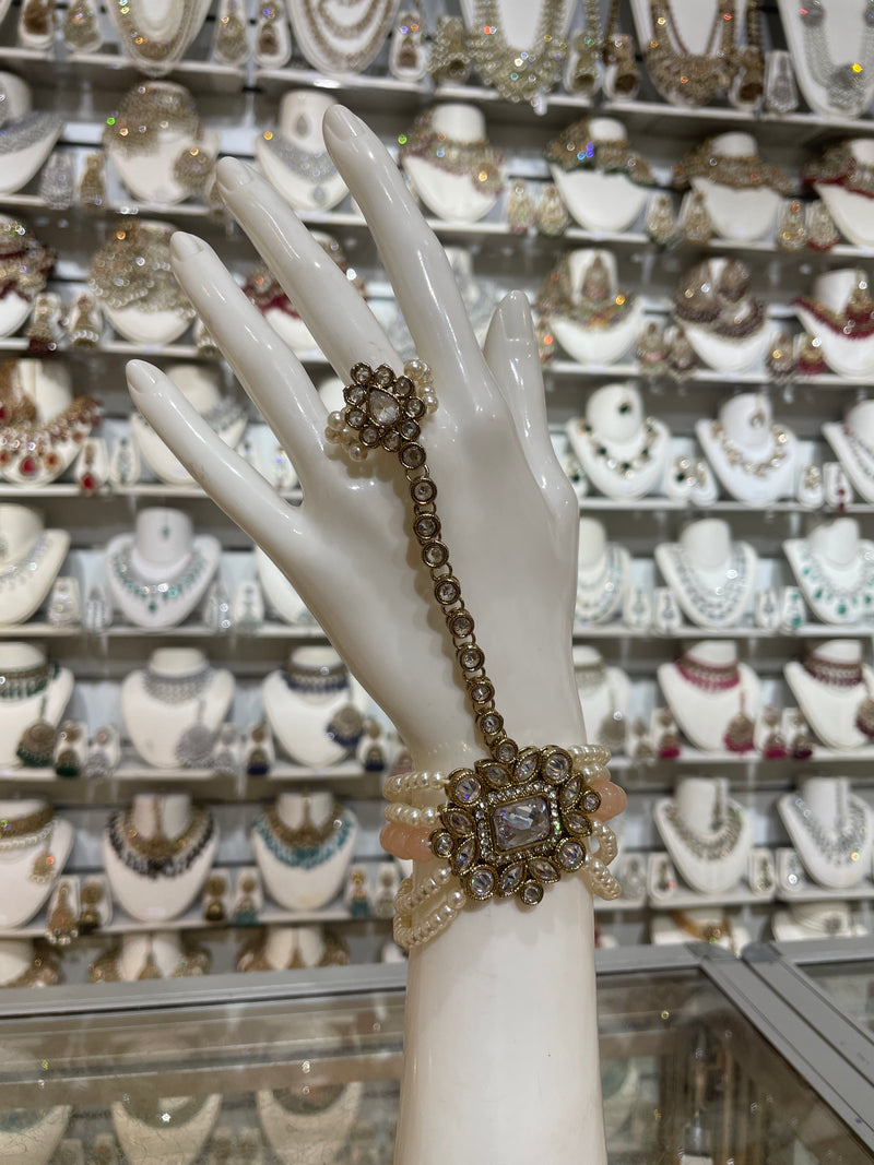 AN07 peach colour polki hand piece