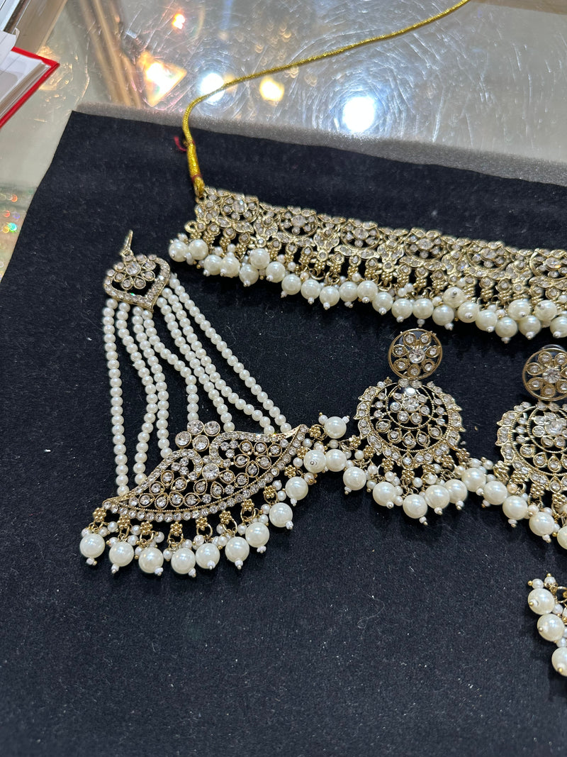PA7802 Gold with white stones choker set comes with earrings tikka and jhumar