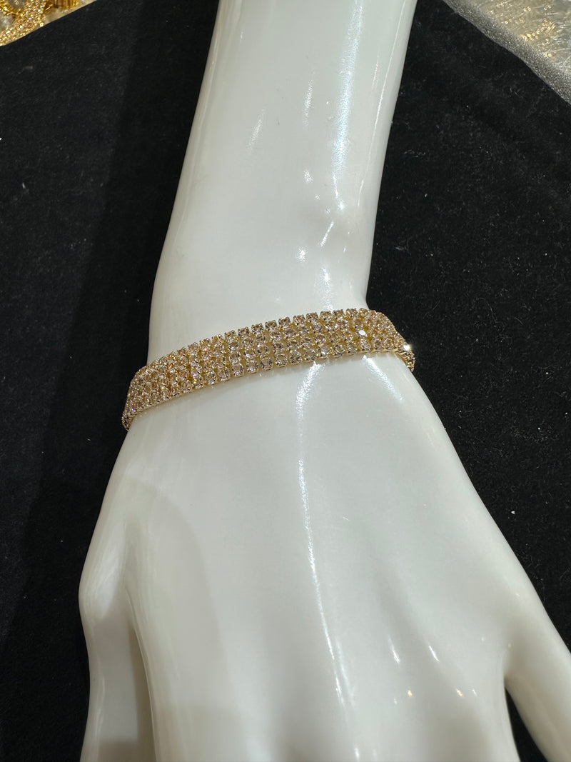 PA112 Gold with white stones bracelet