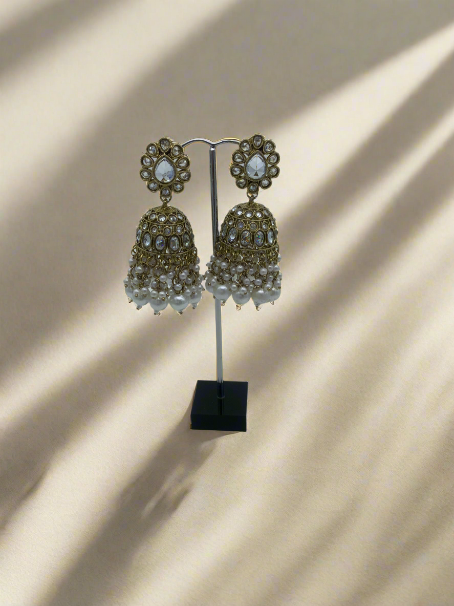 Gold and white jhumka earrings