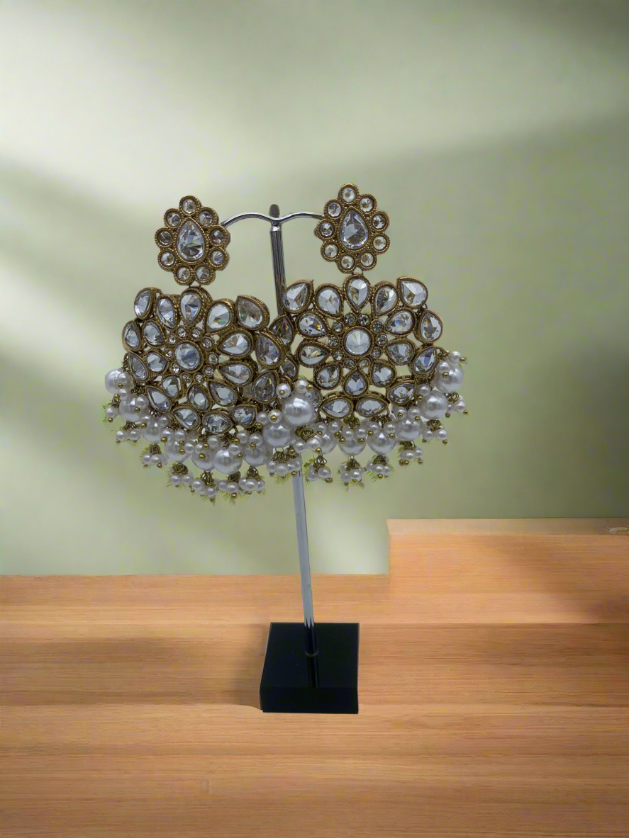 Gold and white earrings