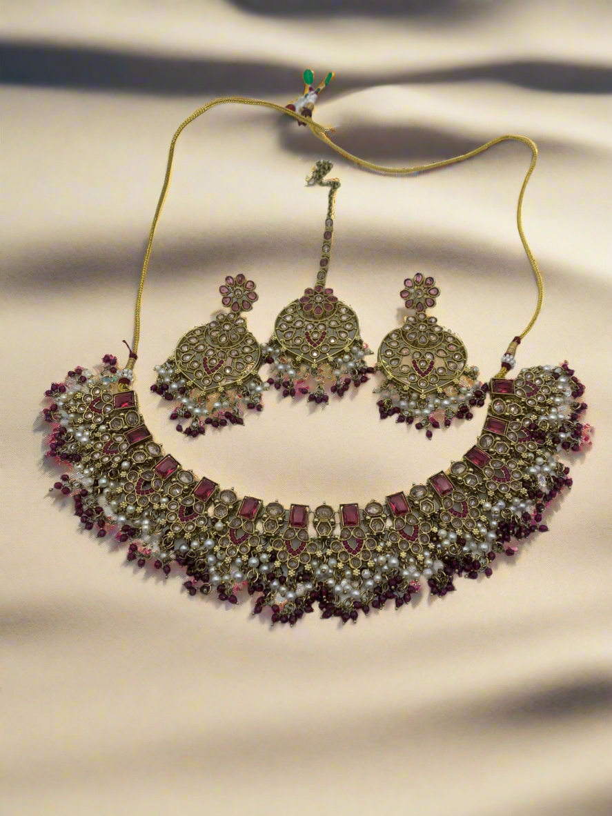 Gold and plum necklace set