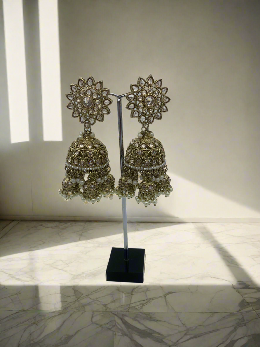 Gold jhumka earrings