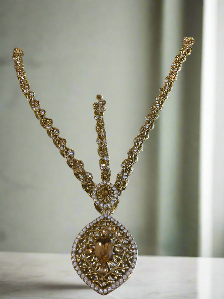 Antique gold and white stone headpiece