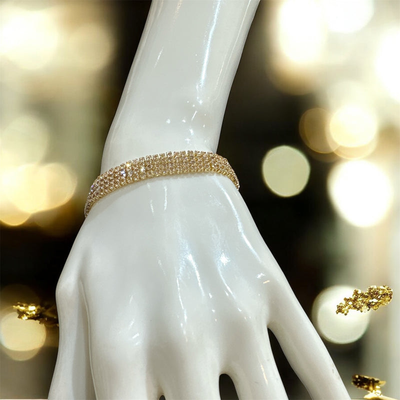 PA123 Gold colour bracelet with white stones