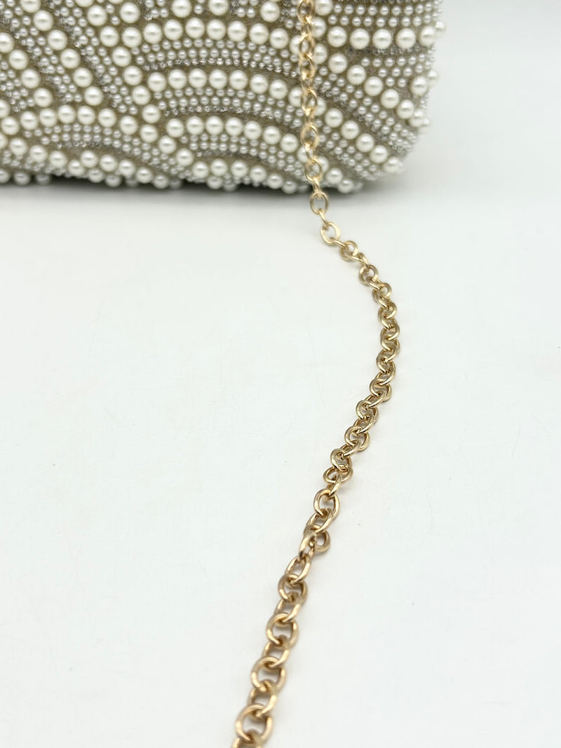 AM703 Gold clutch bag