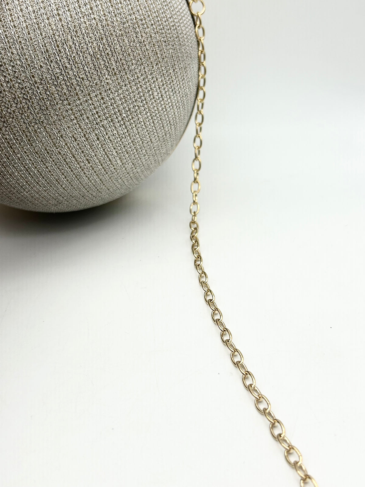 AM707 Gold clutch bag