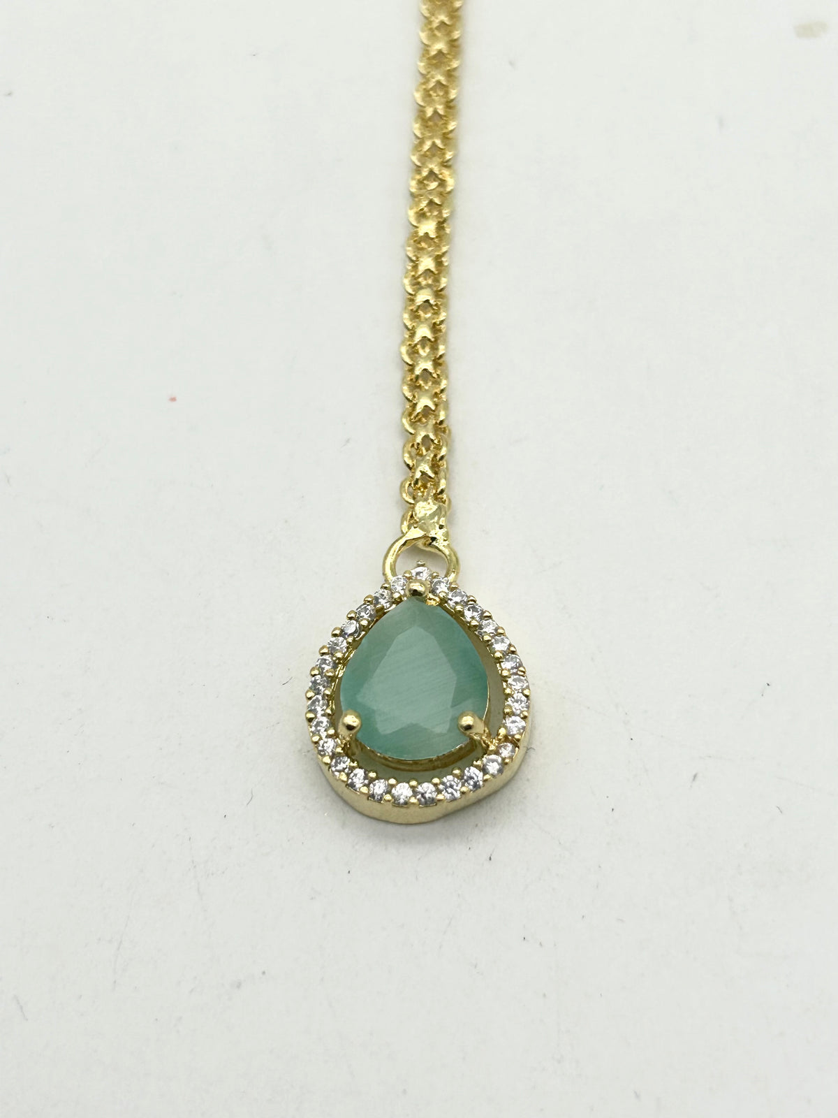 AM666 Gold and Mint tikka American Diamond