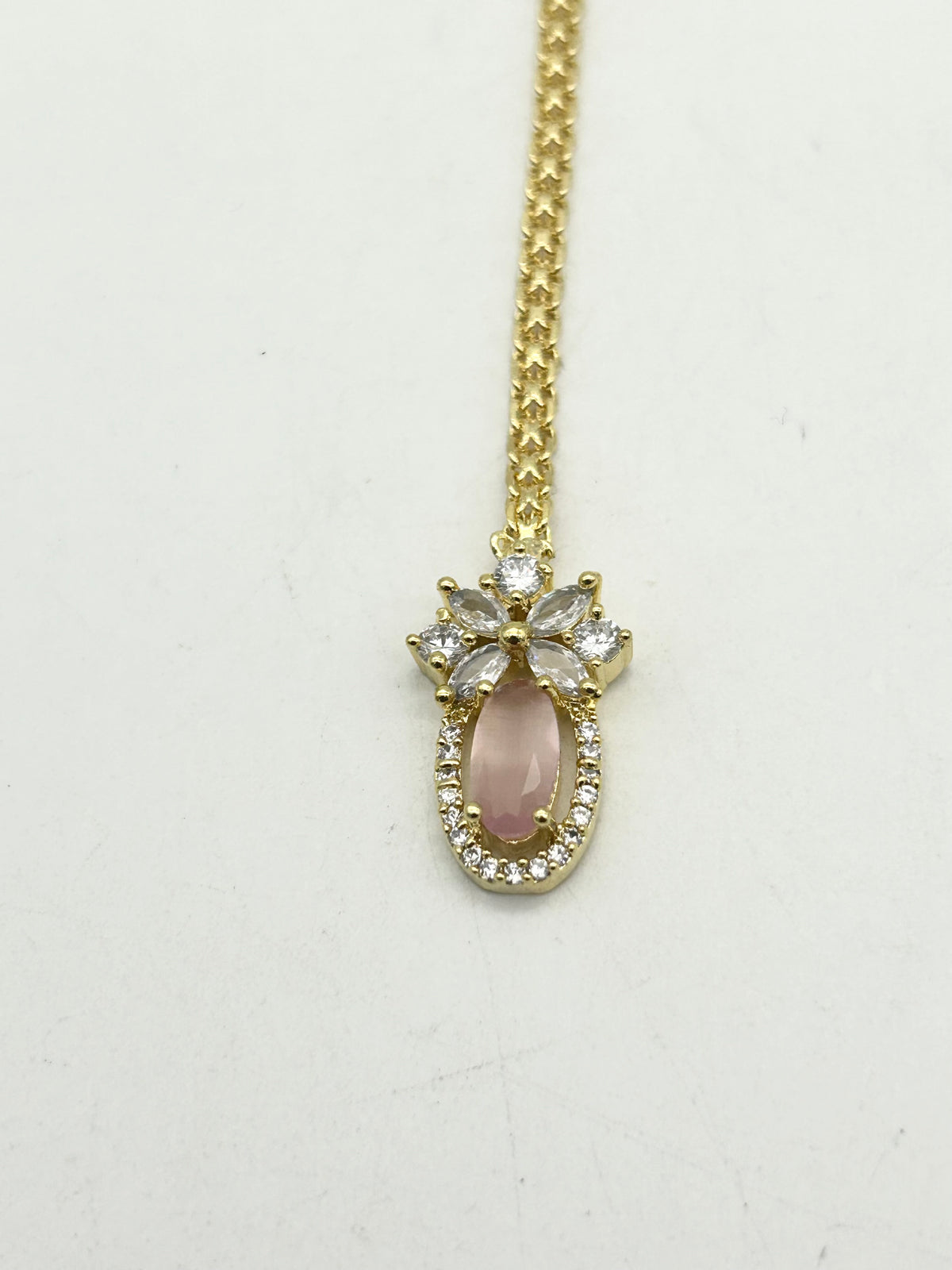 AM667 Gold and Pink tikka American diamond