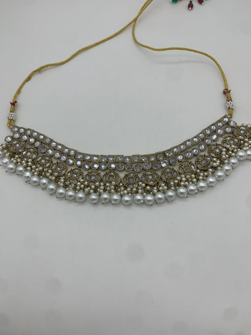 Gold and white necklace set