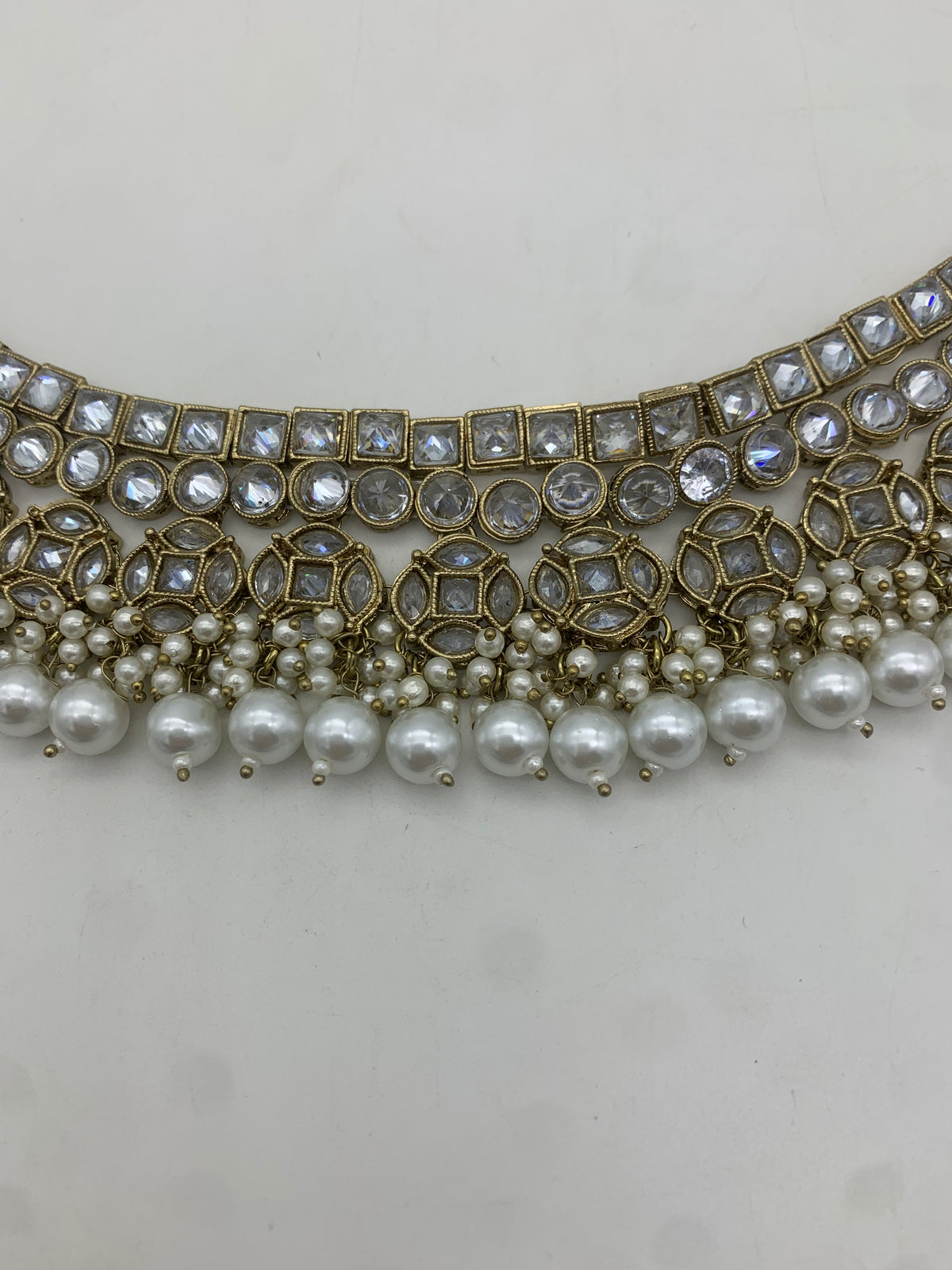 Gold and white necklace set
