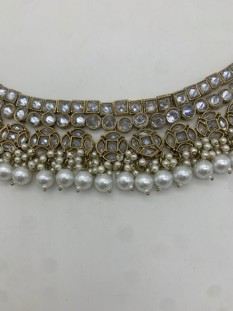 Gold and white necklace set