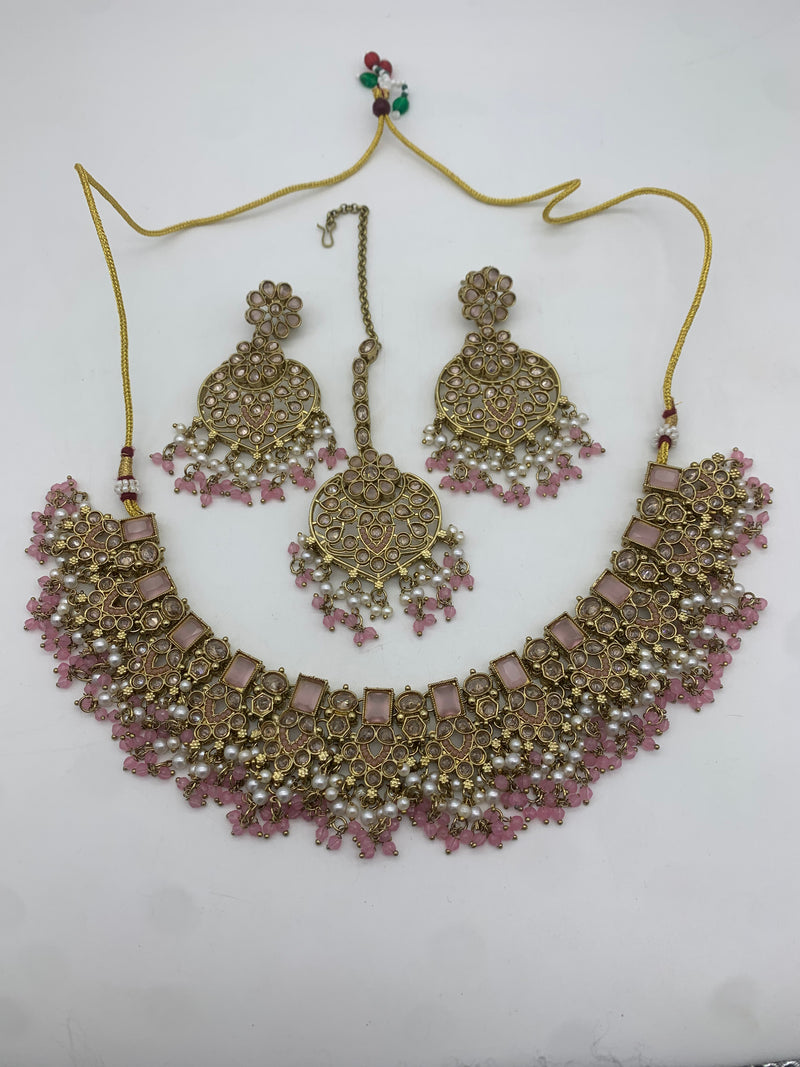 Pastel pink and gold necklace set