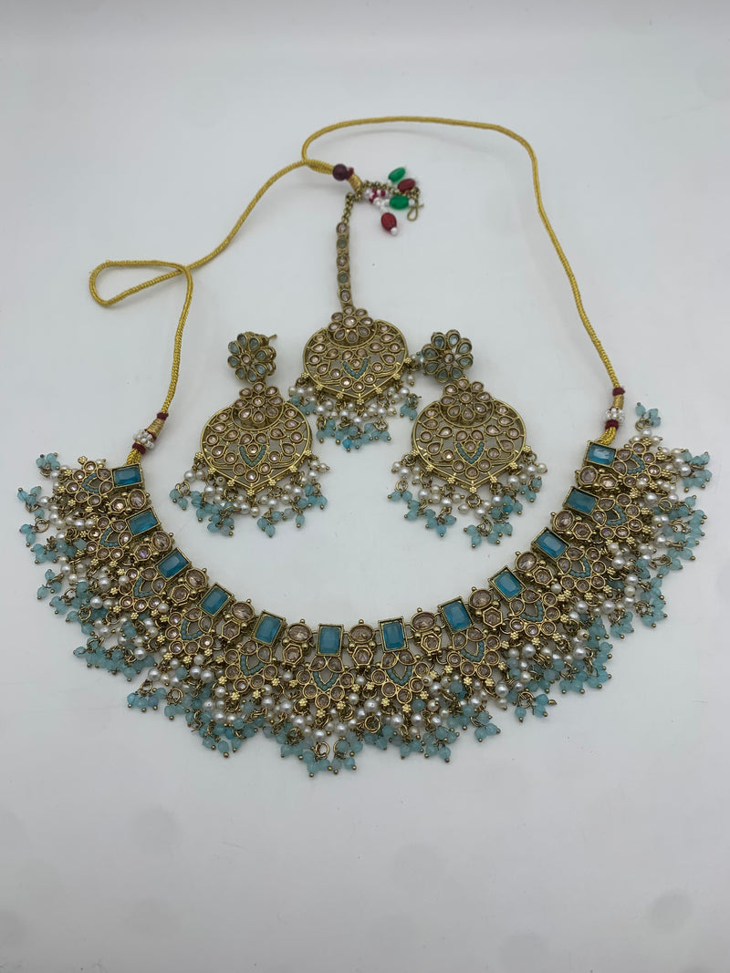 Gold and pastel blue necklace set