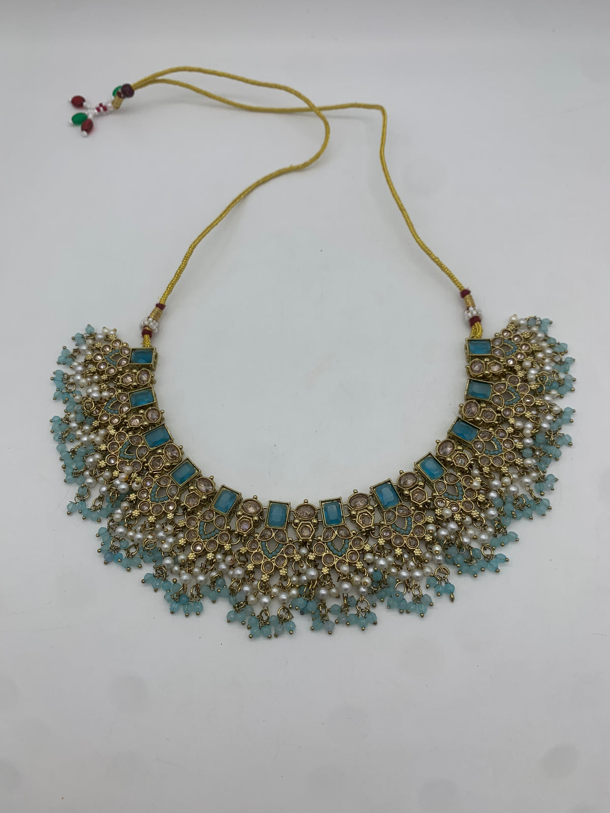 Gold and pastel blue necklace set