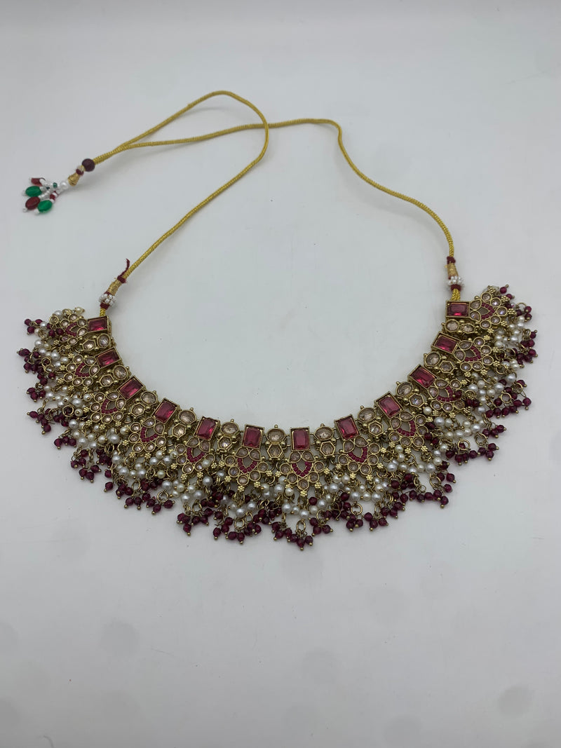 Gold and plum necklace set