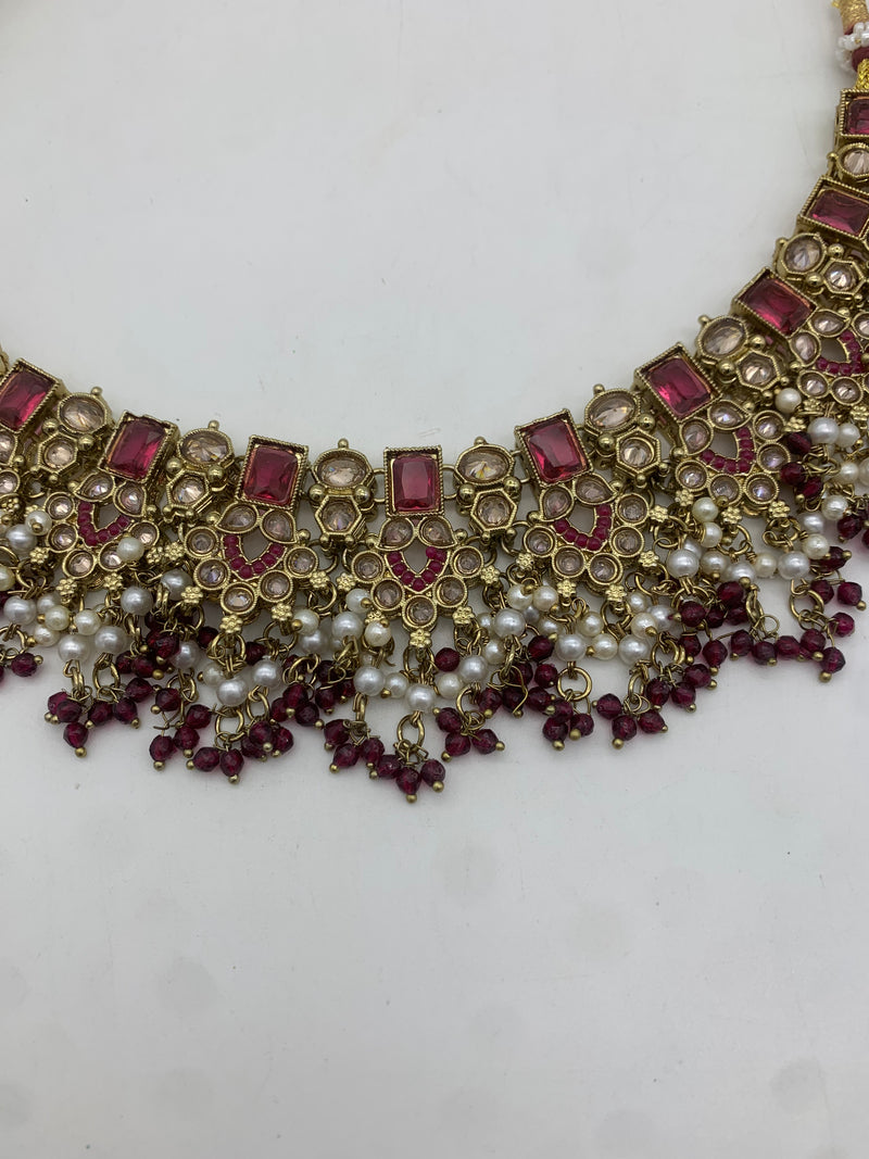 Gold and plum necklace set
