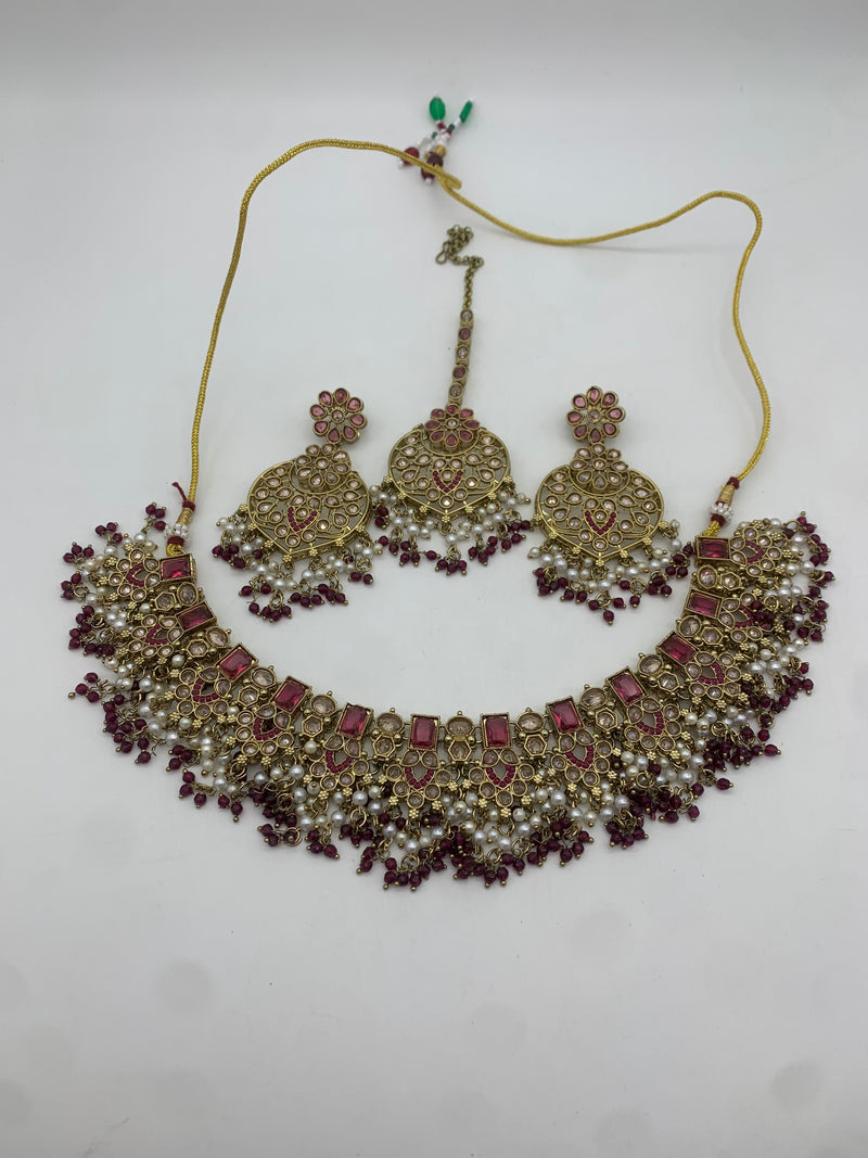 Gold and plum necklace set
