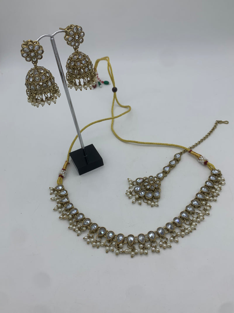 Gold and white necklace set