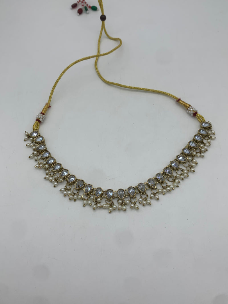 Gold and white necklace set