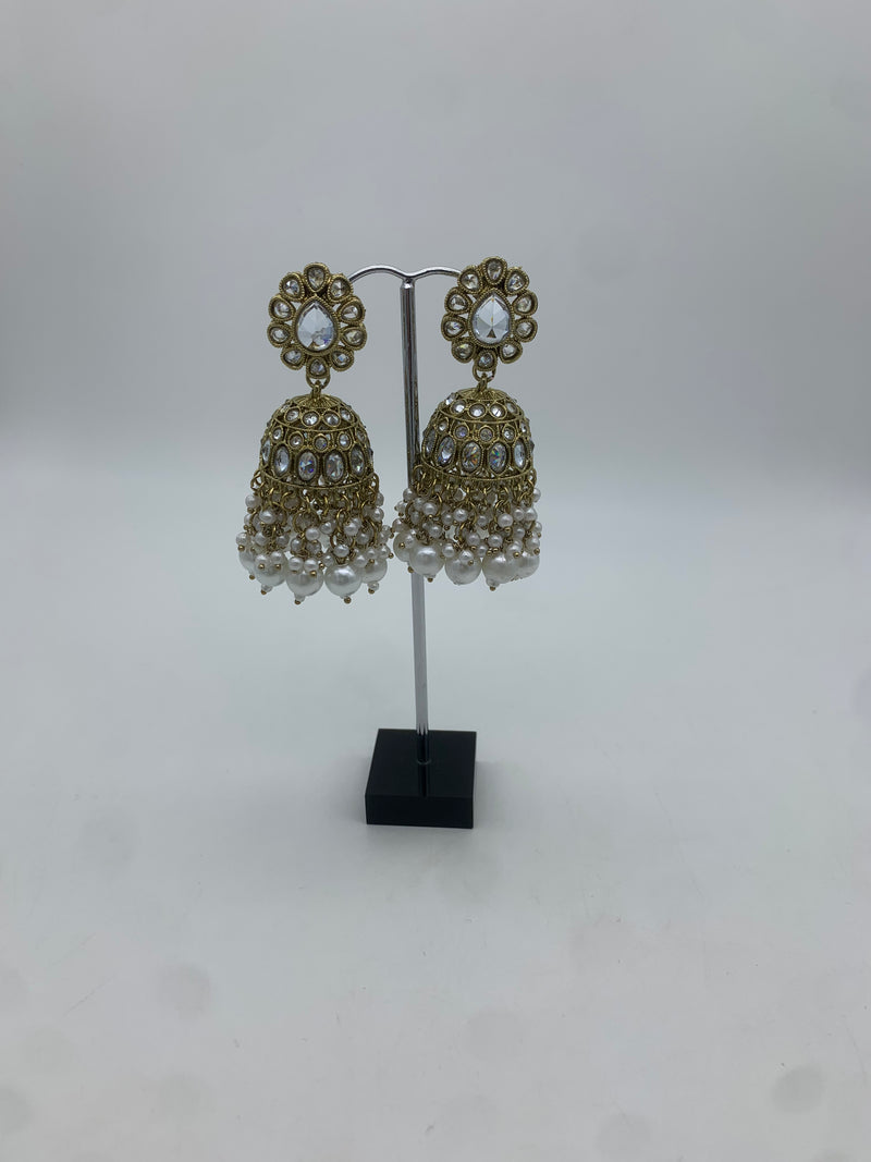Gold and white jhumka earrings