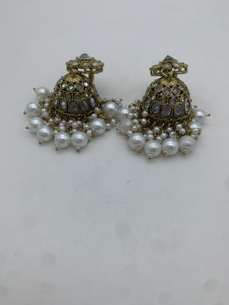 Gold and white jhumka earrings
