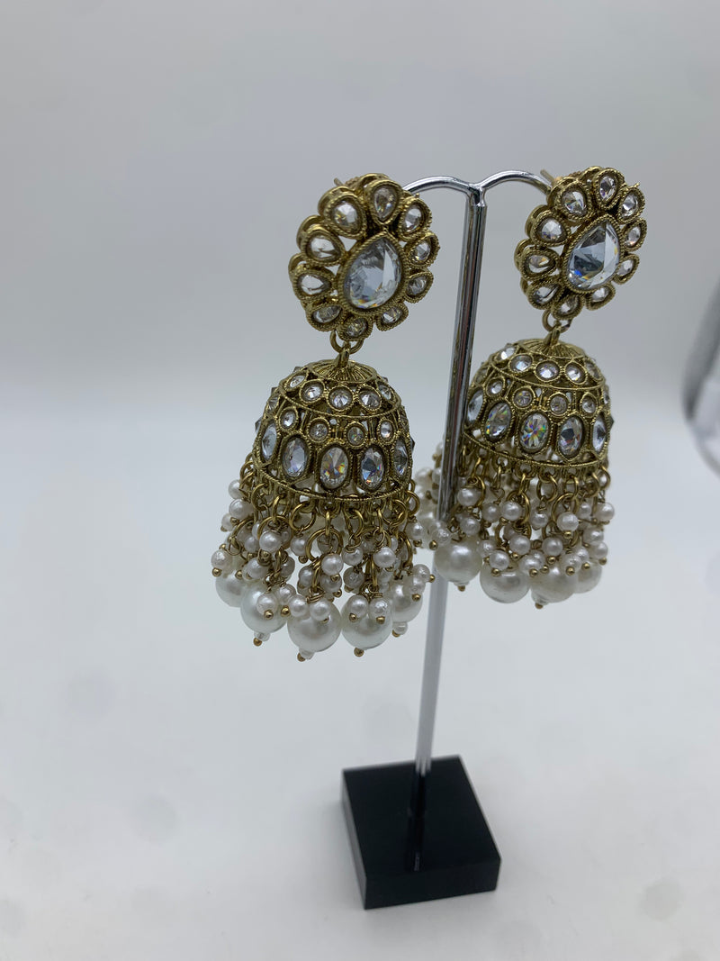 Gold and white jhumka earrings
