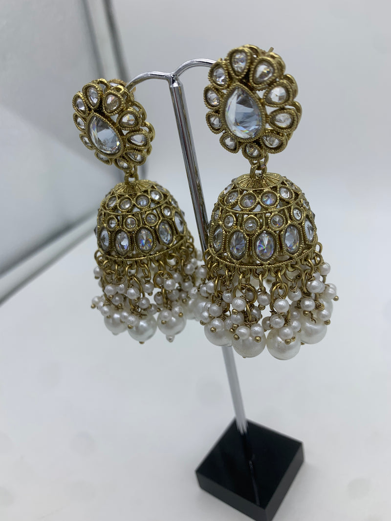 Gold and white jhumka earrings