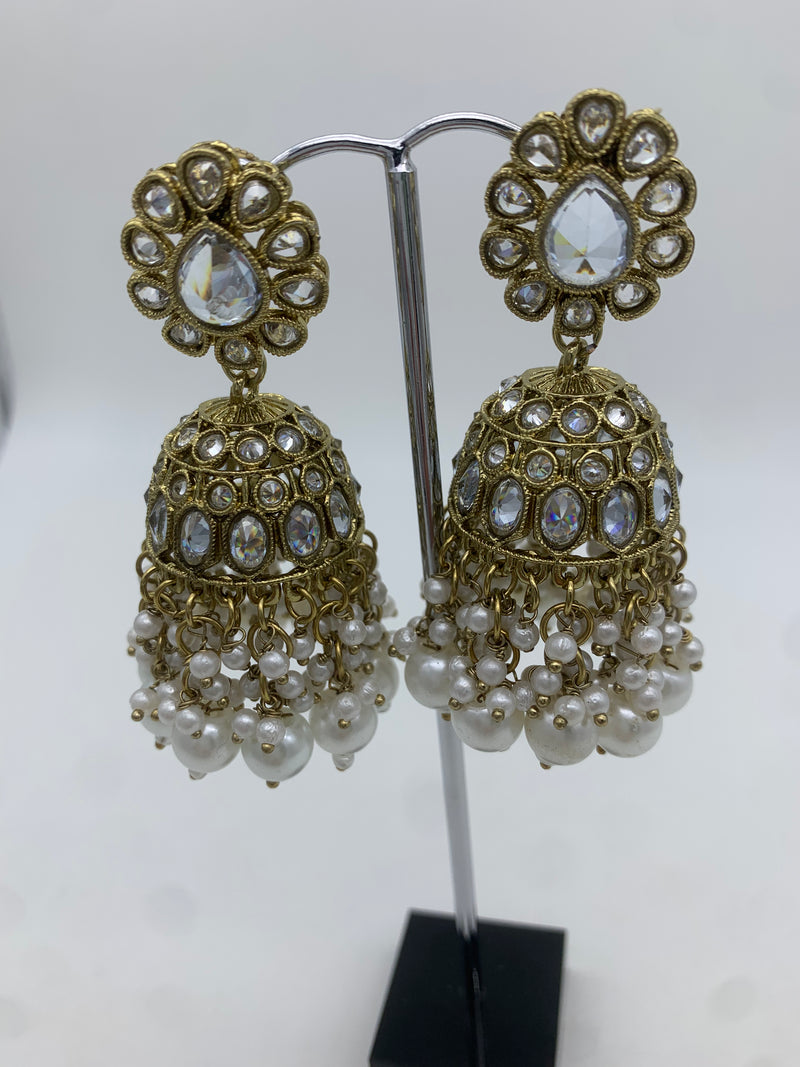 Gold and white jhumka earrings