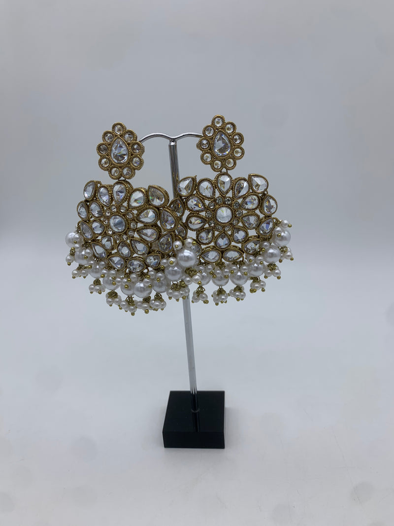 Gold and white earrings