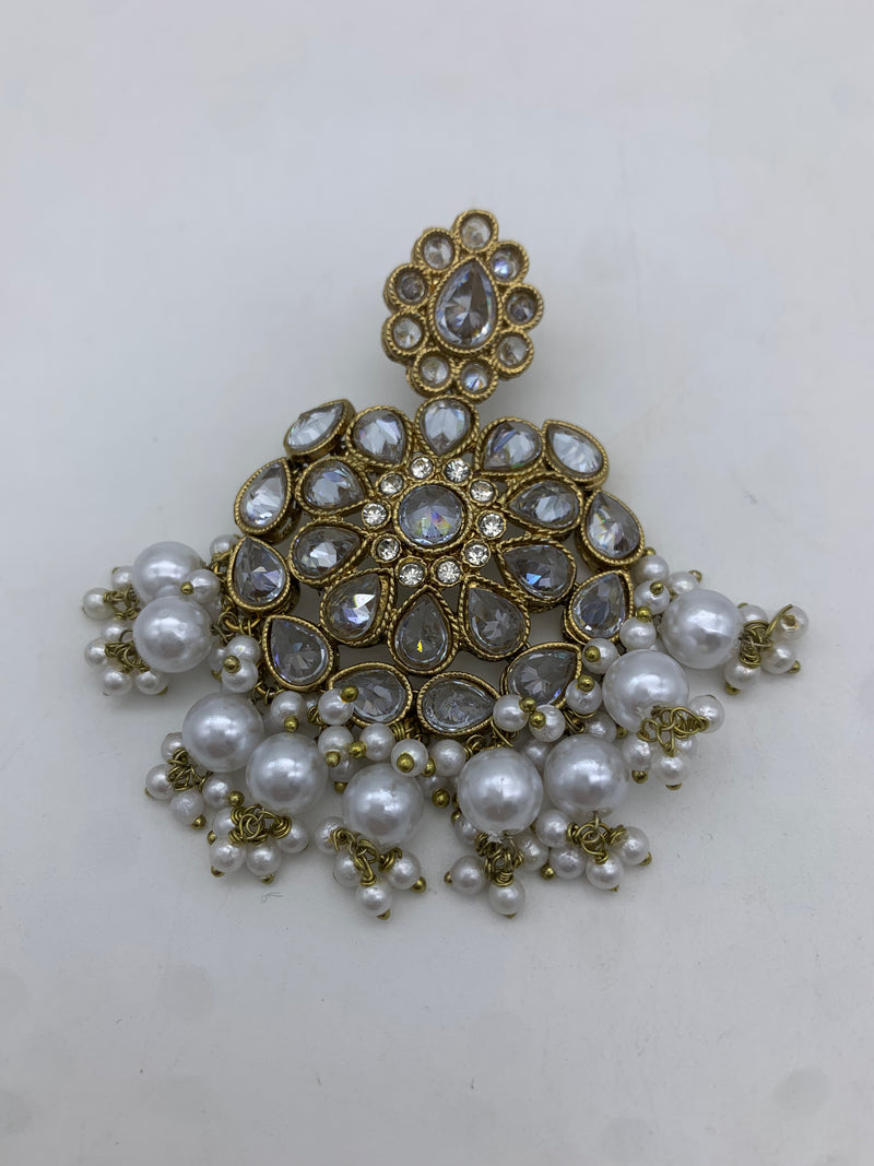 Gold and white earrings