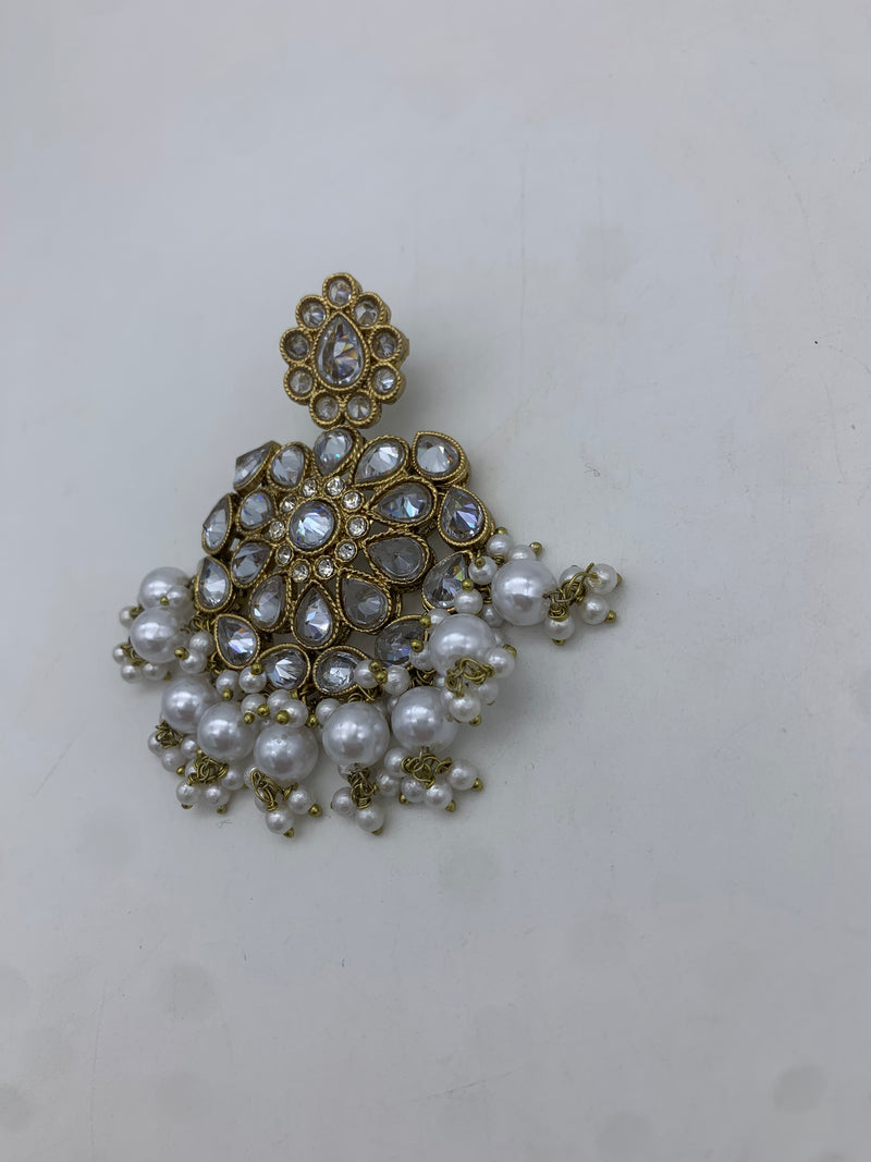 Gold and white earrings