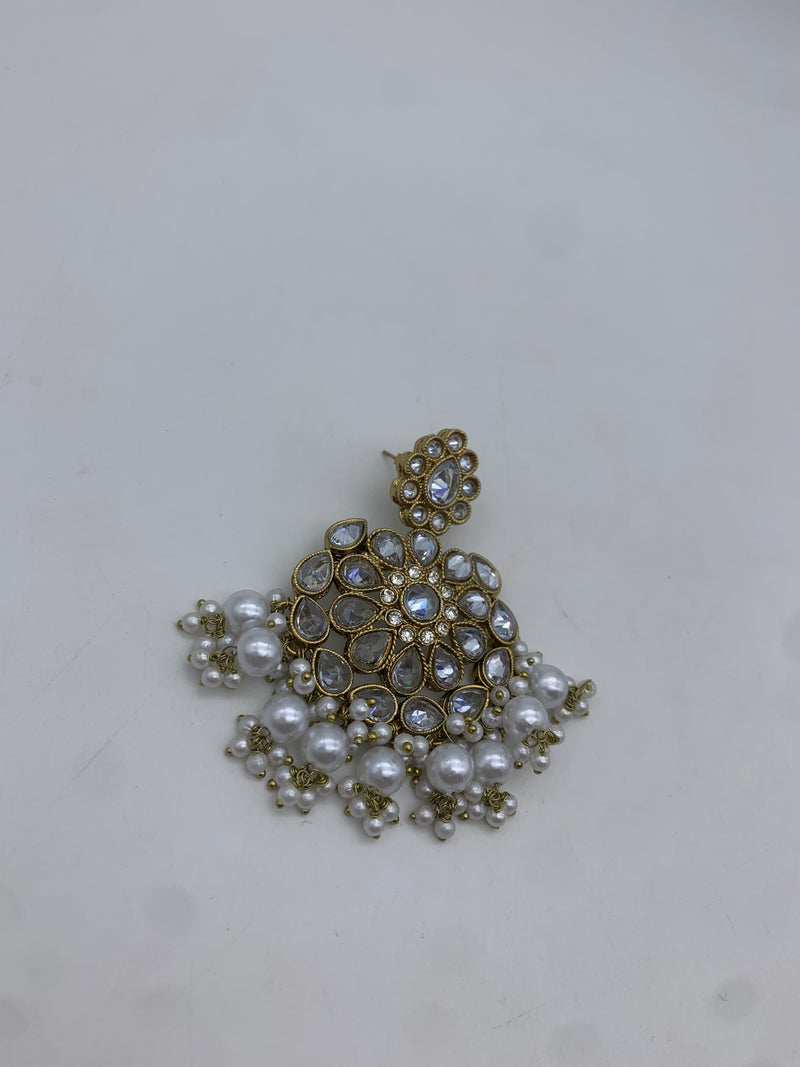 Gold and white earrings