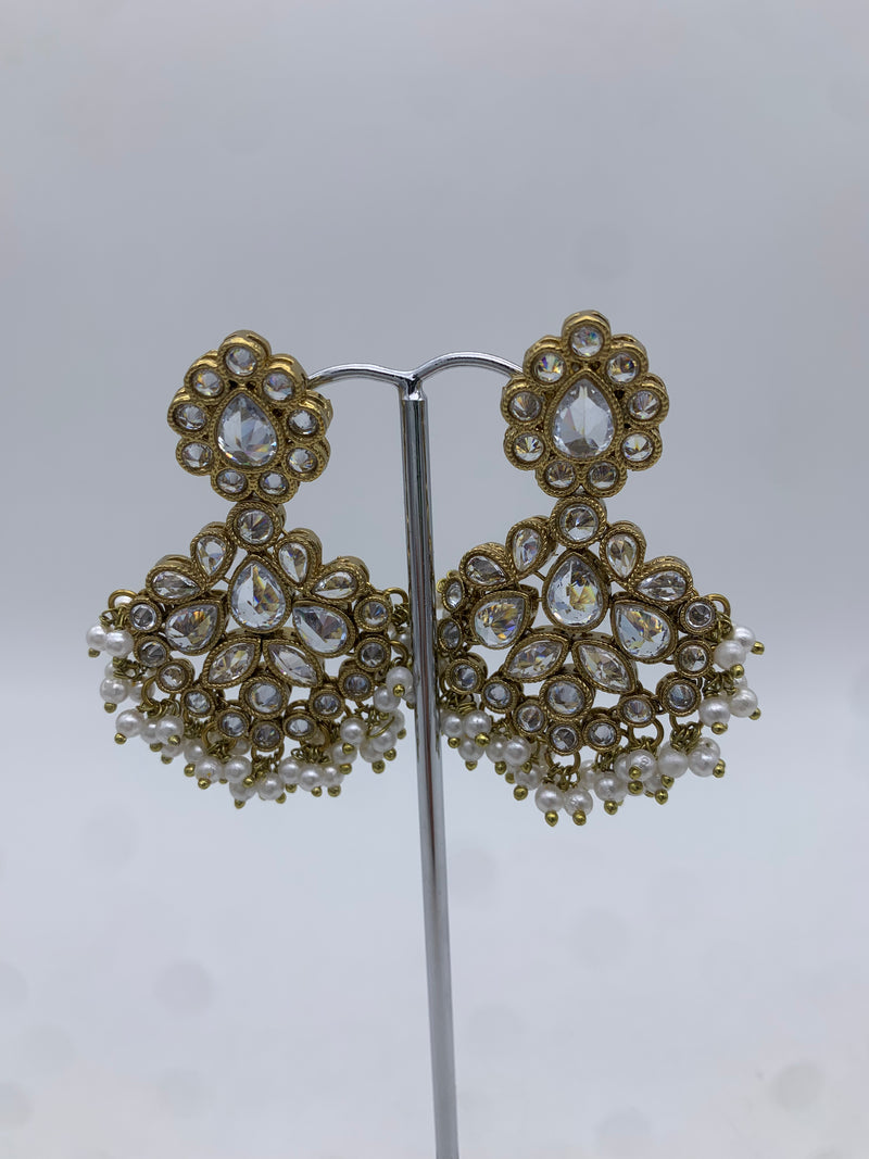 Gold and white earrings