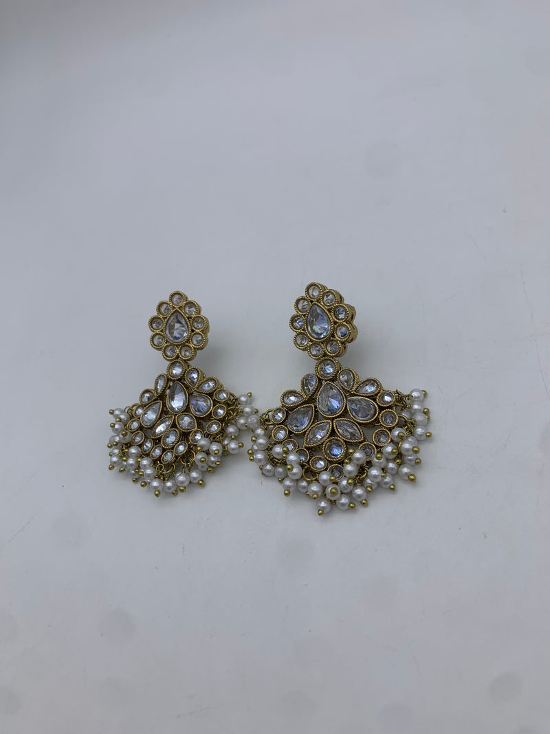 Gold and white earrings