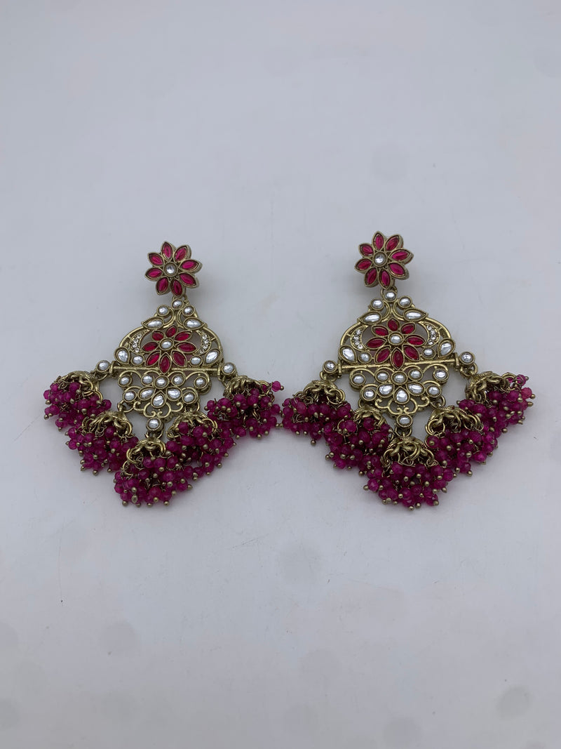 Gold and pink earrings