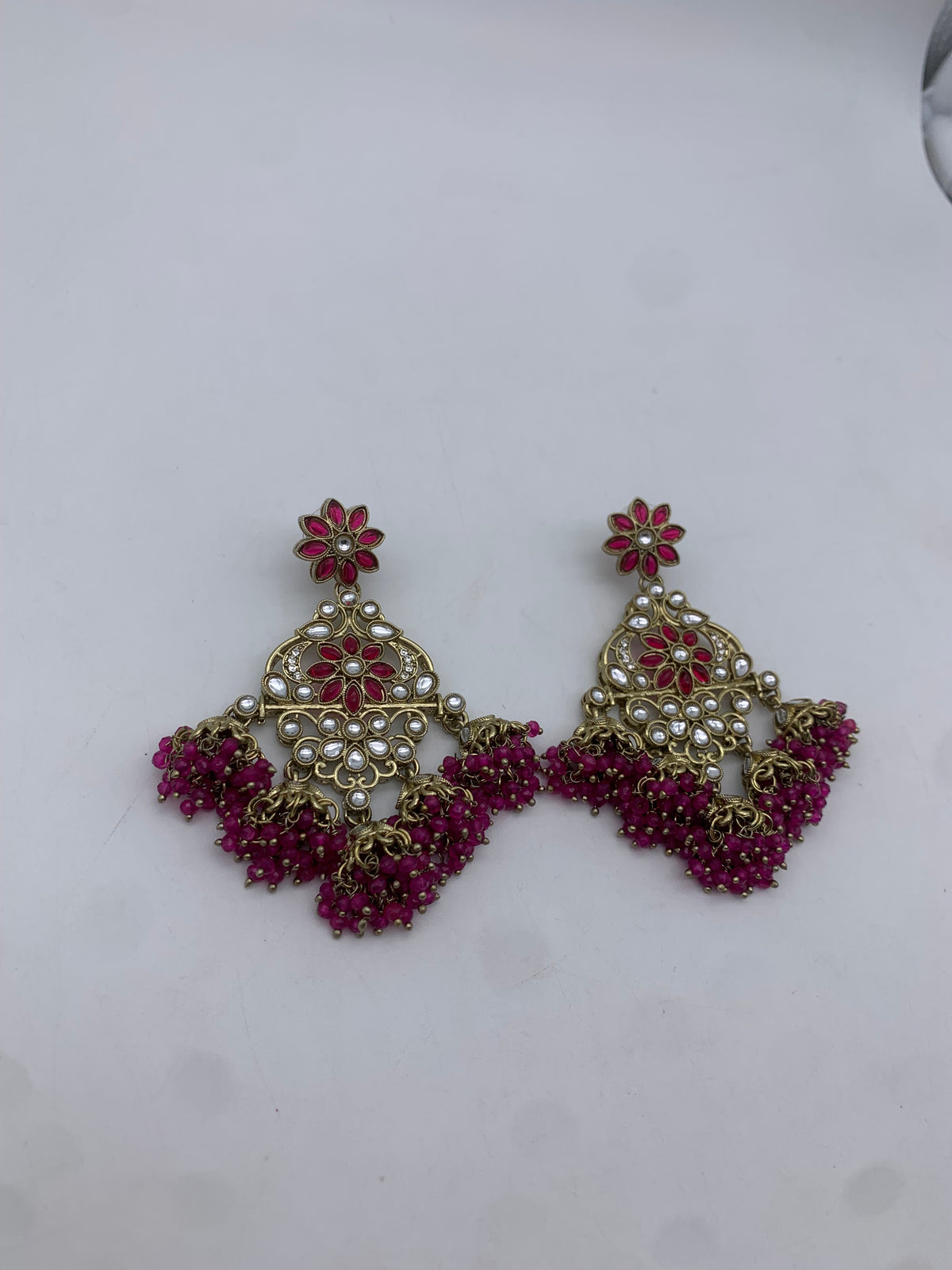 Gold and pink earrings