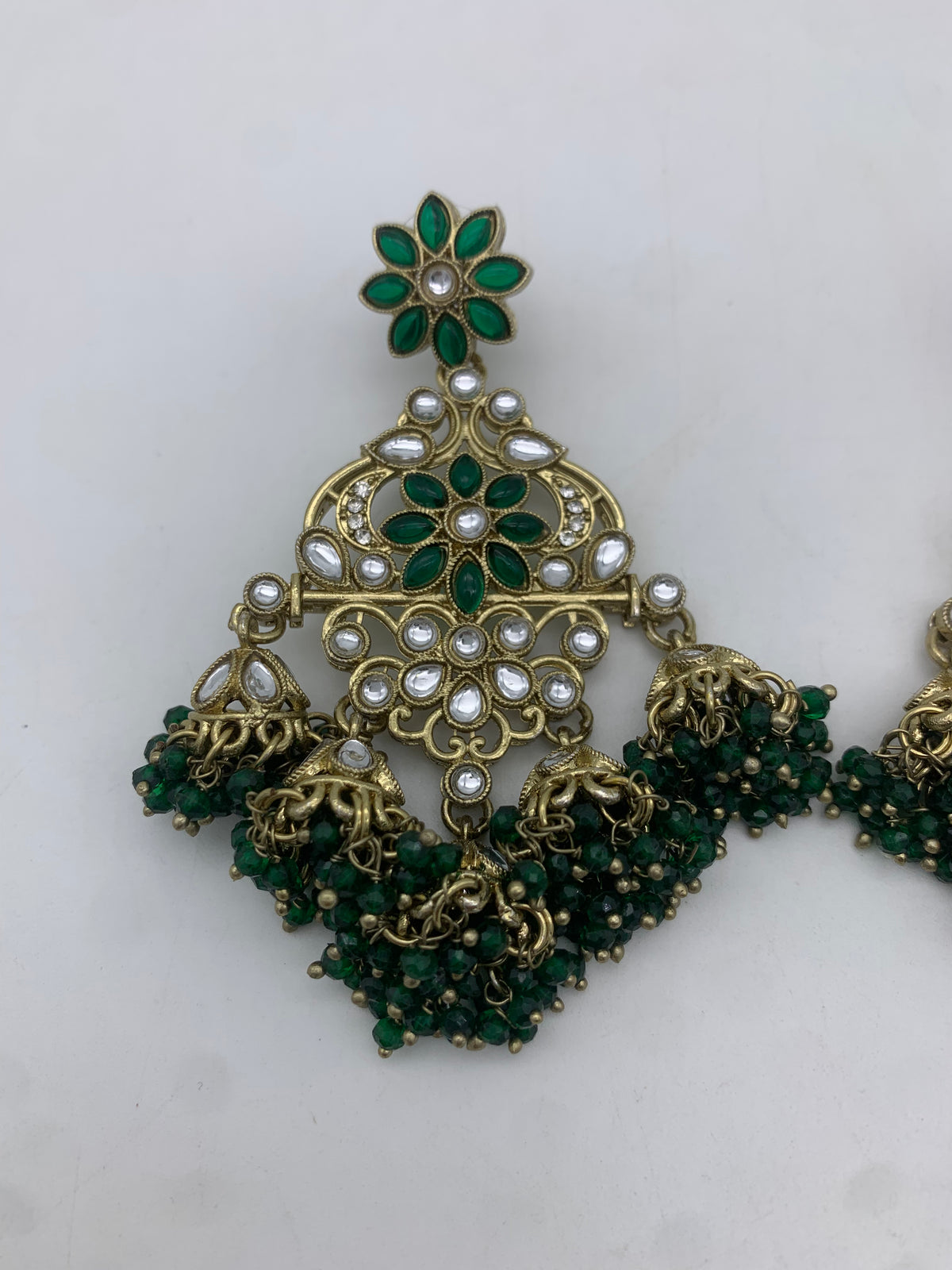 Gold and green earrings