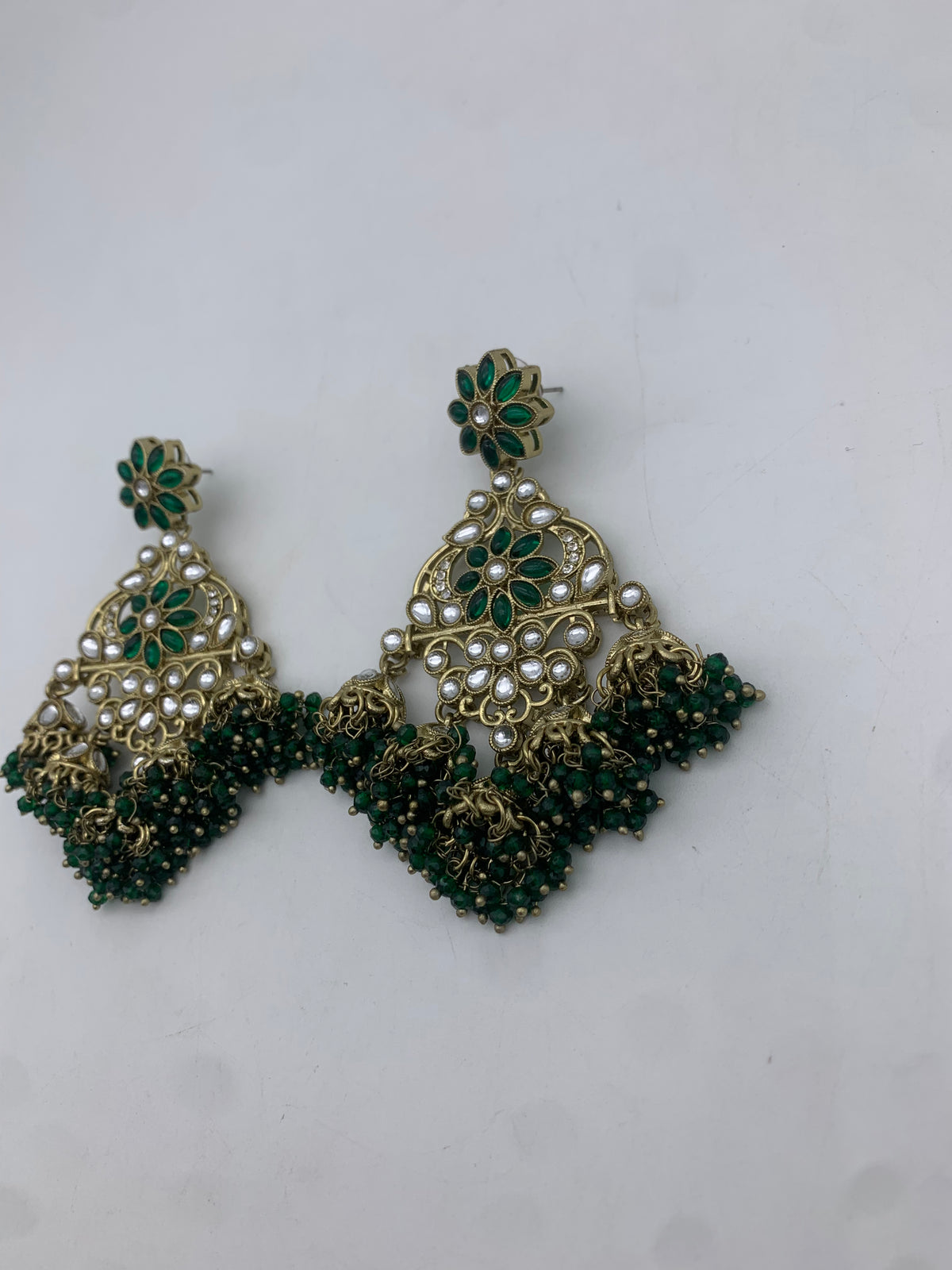 Gold and green earrings