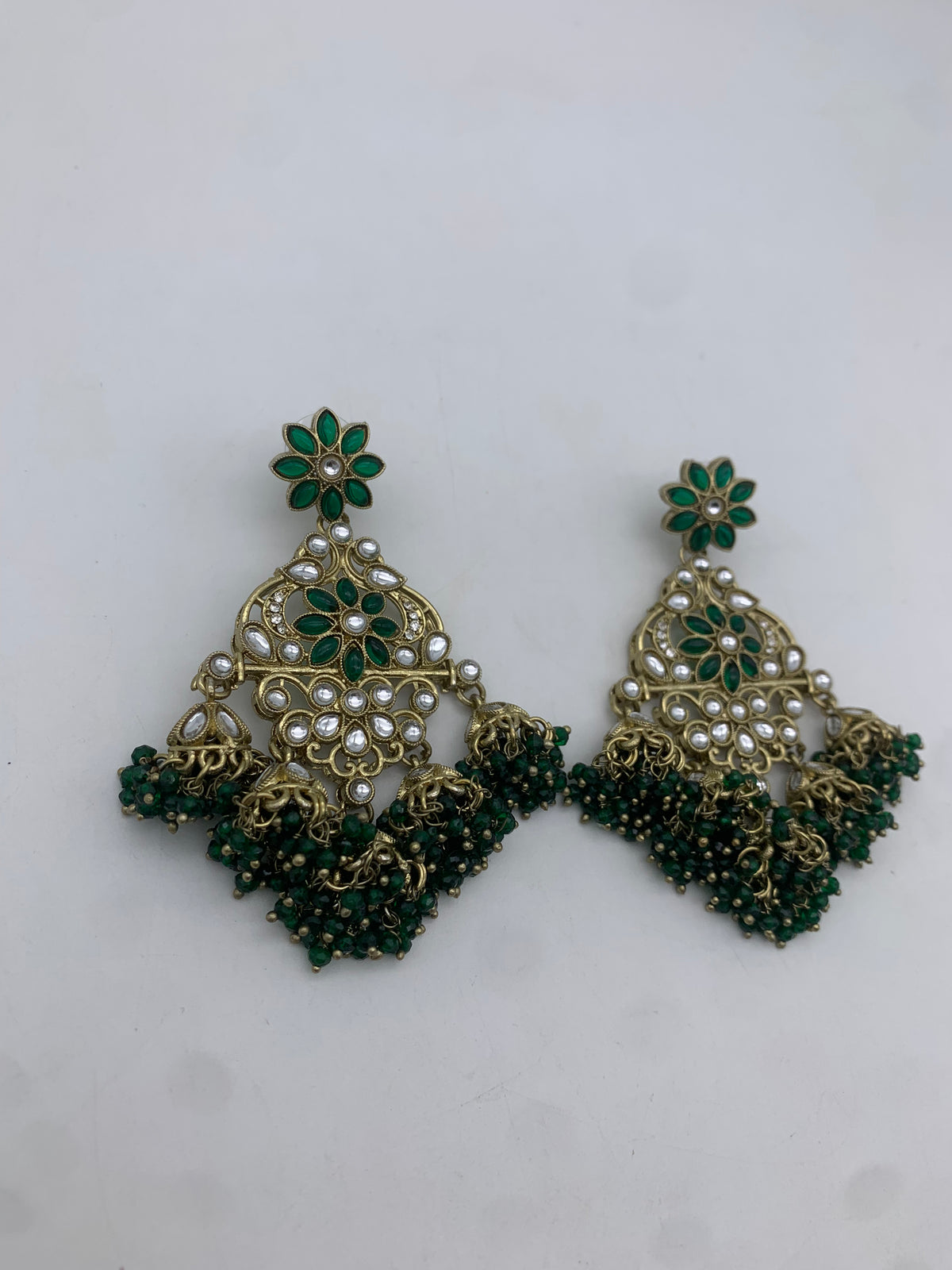 Gold and green earrings